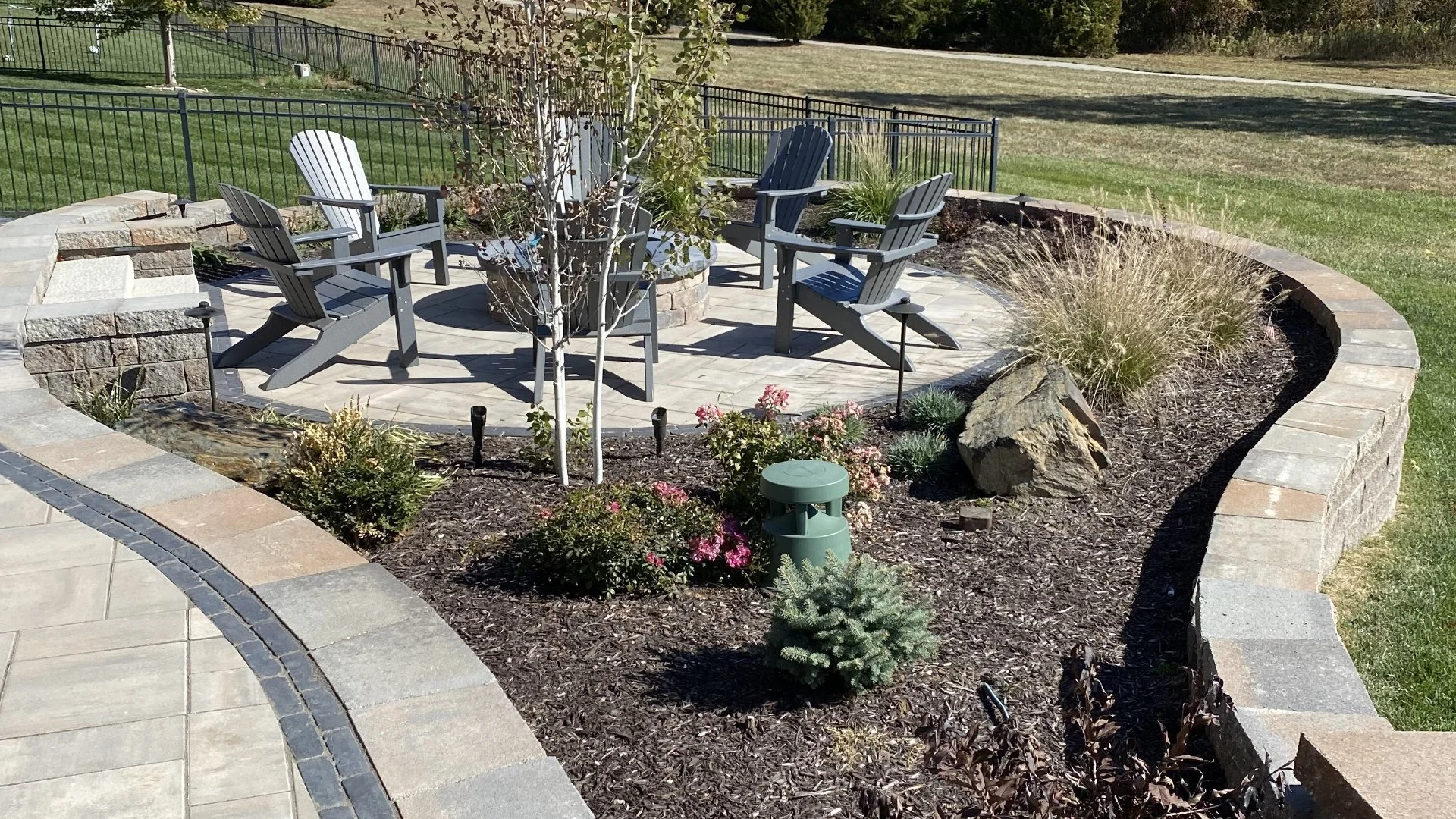 Well-manicured lawn and landscape in Olathe, KS.