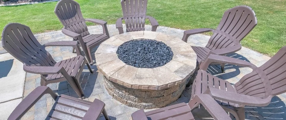 Chairs and a round fire pit in Olathe, KS.
