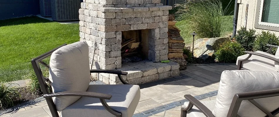 Chairs in front of an outdoor fireplace in Prairie Village, KS.
