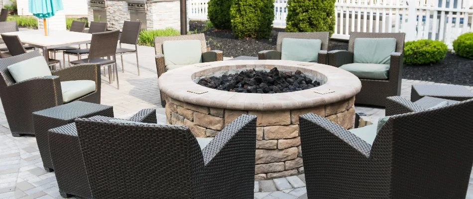 Fire pit surrounded by chairs on a property in Olathe, KS.