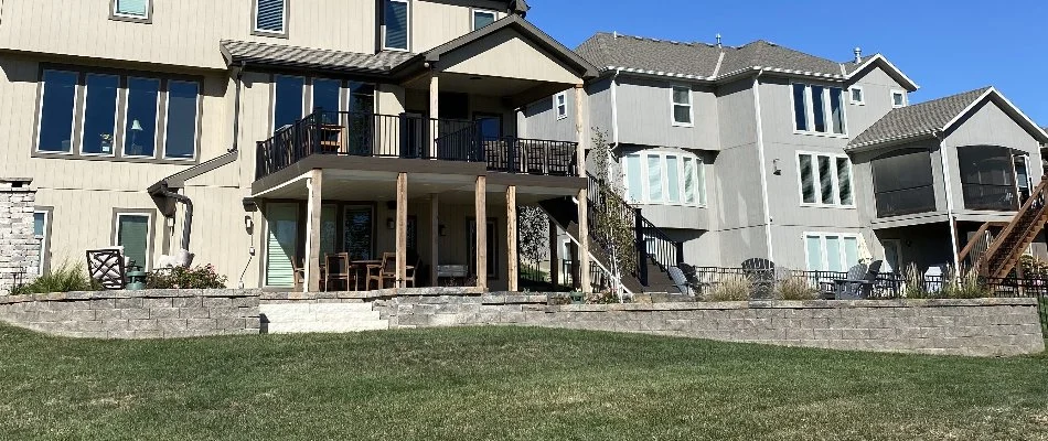 House in Olathe, KS, with a retaining wall.
