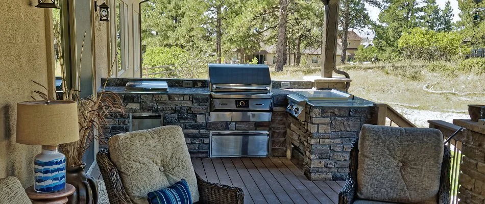 Outdoor kitchen with a grill in Olathe, KS.