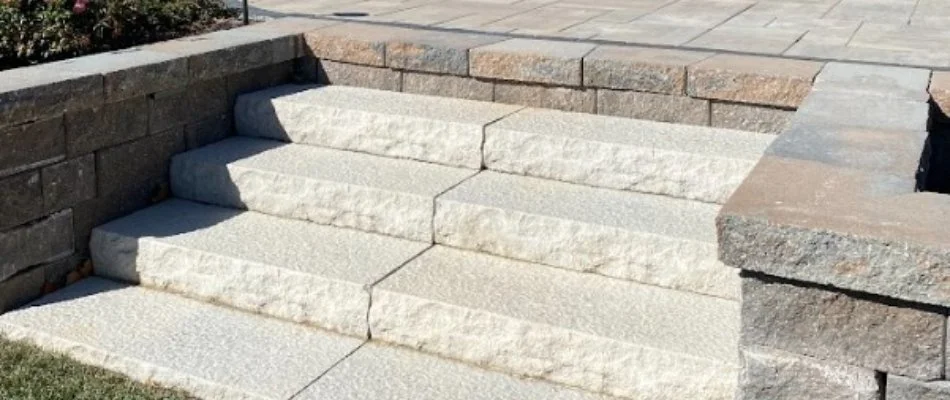 Outdoor steps leading to a patio on a property in Olathe, KS.