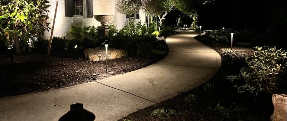 Outdoor lighting along a walkway in Olathe, KS.