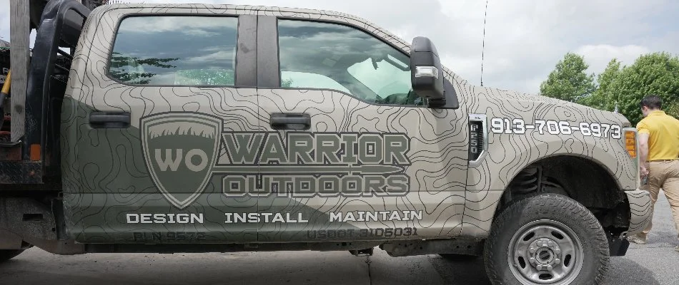 Landscape bed filled with plants in Leawood, KS.